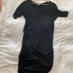 A pencil maternity black dress